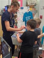 Nurse with students